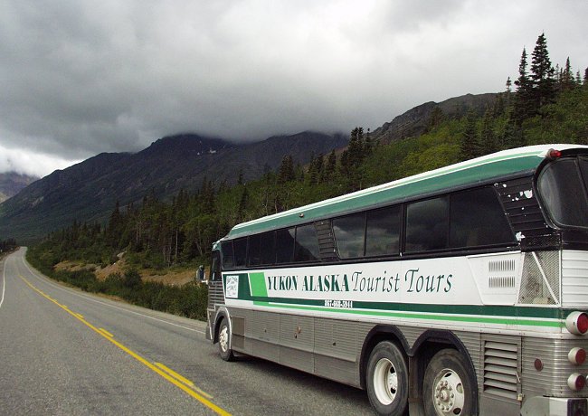 A Yukon Alaska Tourist Tours motorcoach en route from Whitehorse, Yukon to Skagway, Alaska.