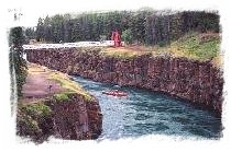 Canoeing through Miles Canyon, on the Yukon River near Whitehorse.