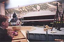 Children enjoying the Whitehorse waterfront model at the Yukon Transportation Museum.
